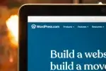 Computer monitor and keyboard for troubleshooting WordPress text formatting