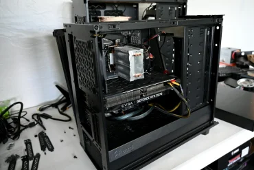 Desktop computer hardware during a PC build and hard drive installation