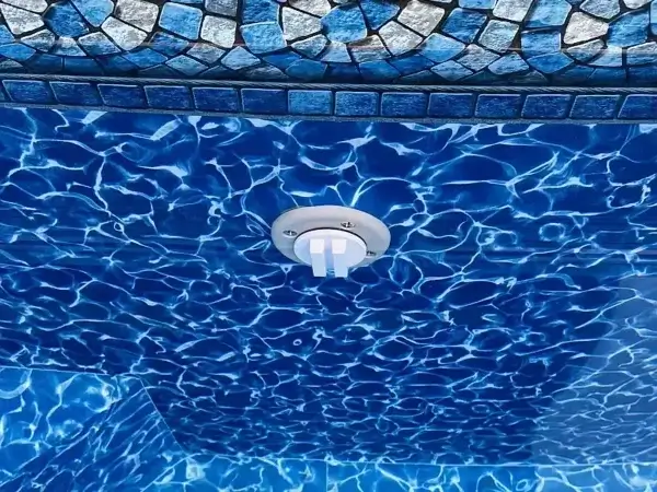 Inserting pool nozzle plugs Insert pool nozzle plugs